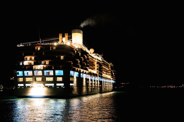 closeup-cruise-liner-sea-night-night-lighting-ship_278455-7709